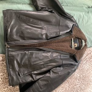 Black weatherproof leather jacket. Size S.